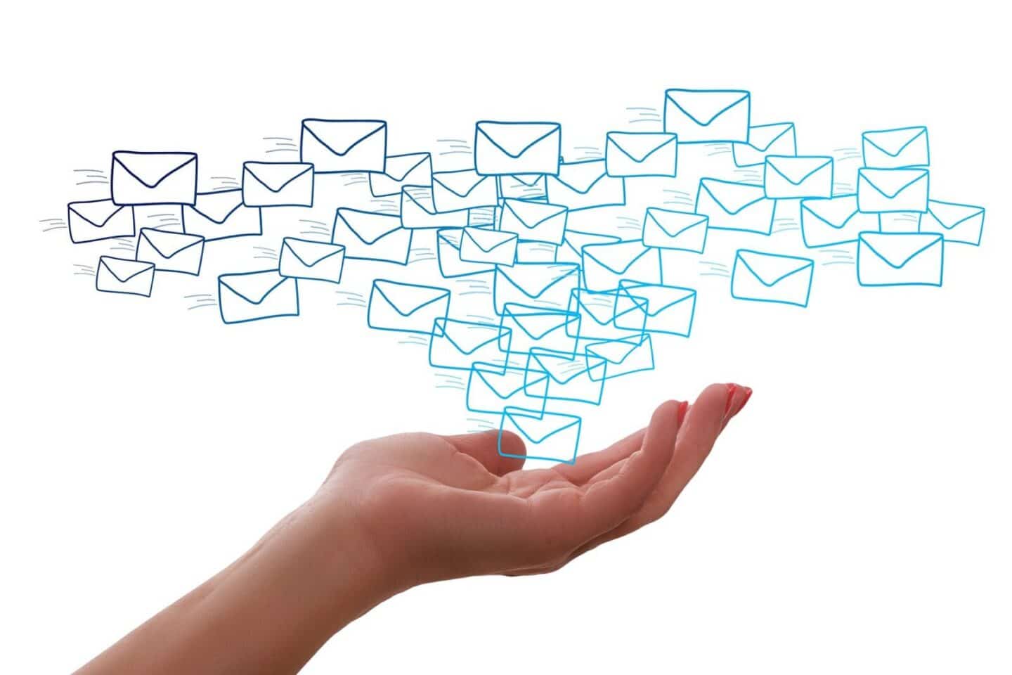 Hand releasing multiple illustrated envelopes.