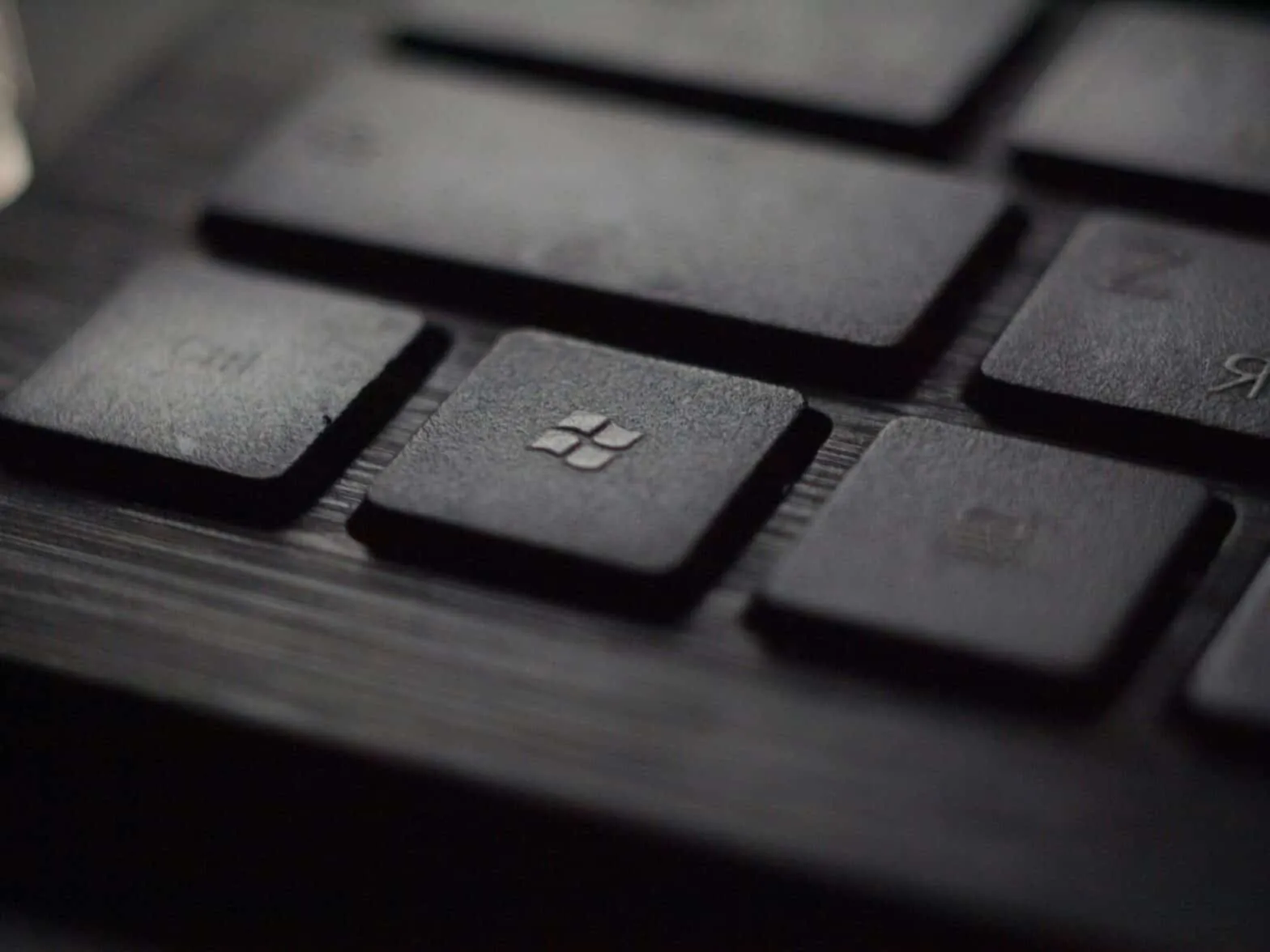 Close-up of keyboard with Windows key.