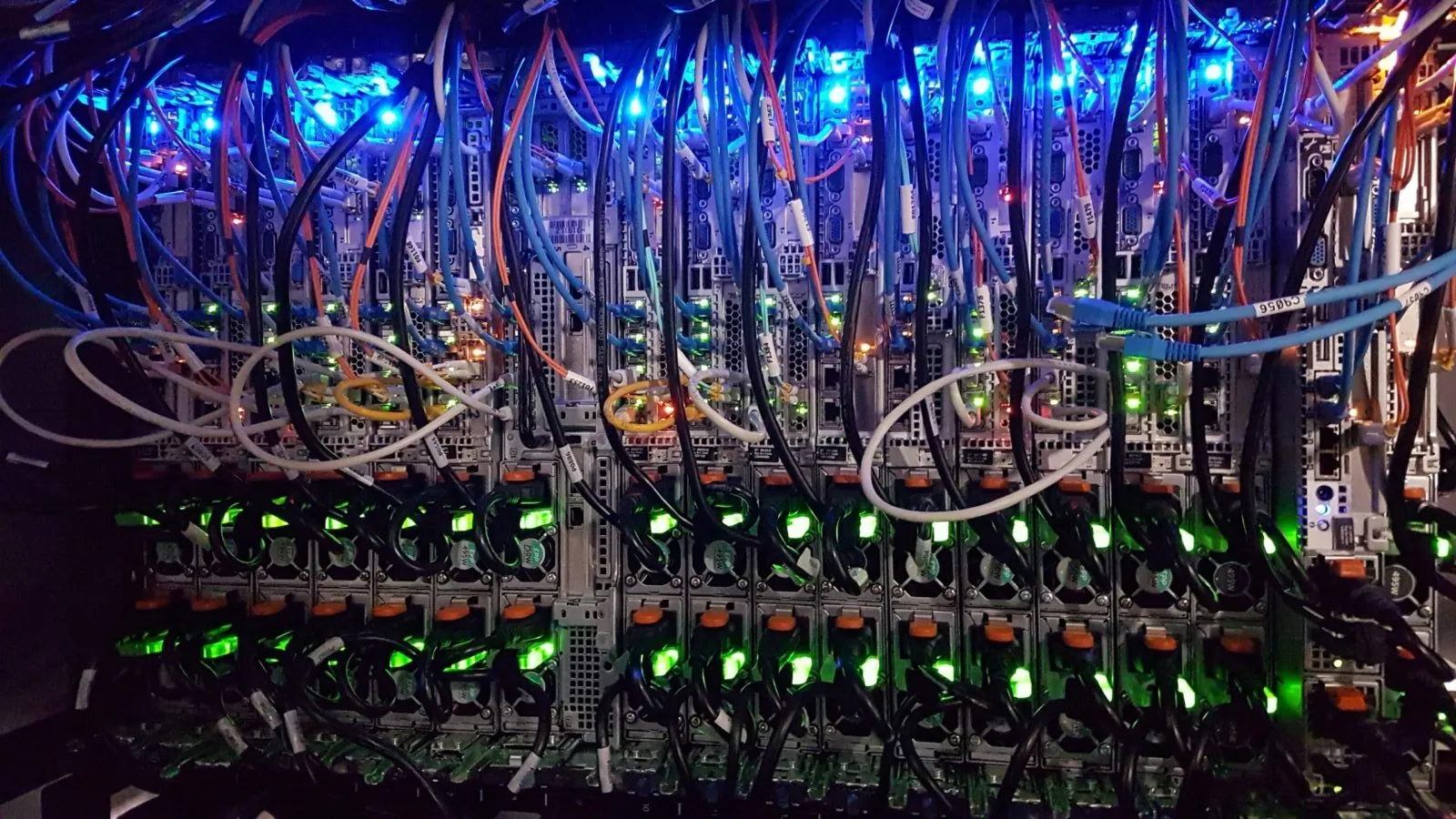 Colorful network cables on a server rack.